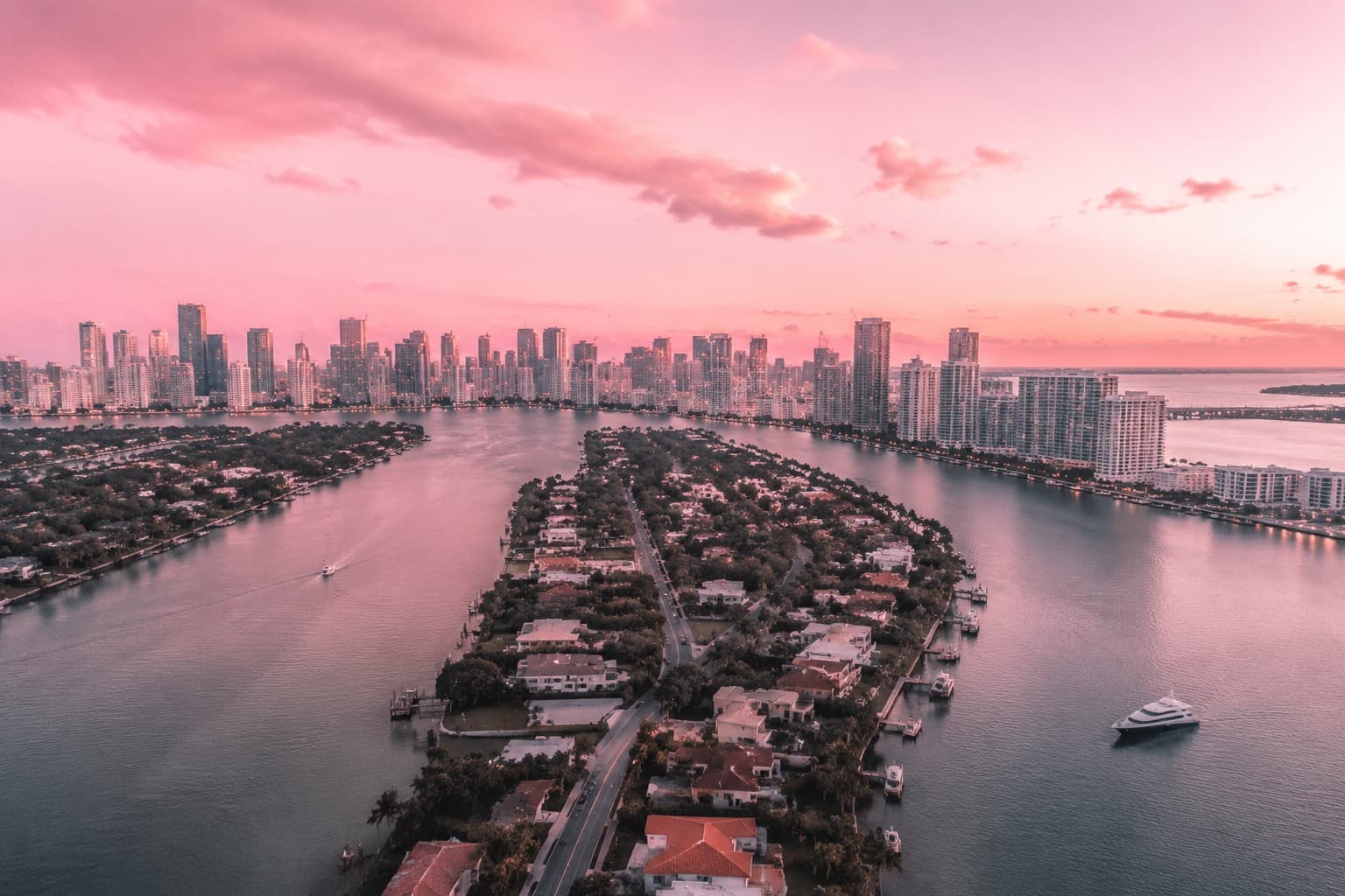 Miami's islands and skyline from the air at sunset